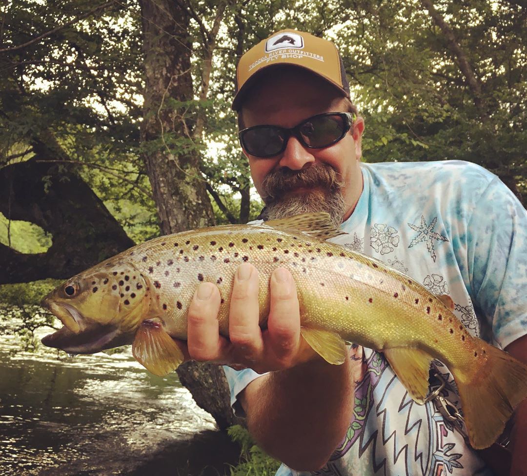 Owner/Head Guide Joe DiPietro Holding Fish